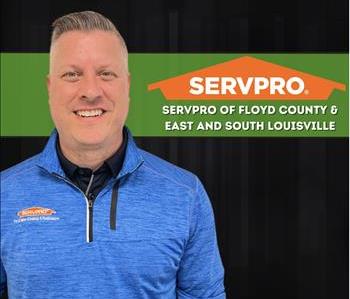 man smiling at camera with SERVPRO shirt and SERVPRO logo 